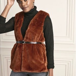 New in the bag Stella Dot faux fur vest. XS.